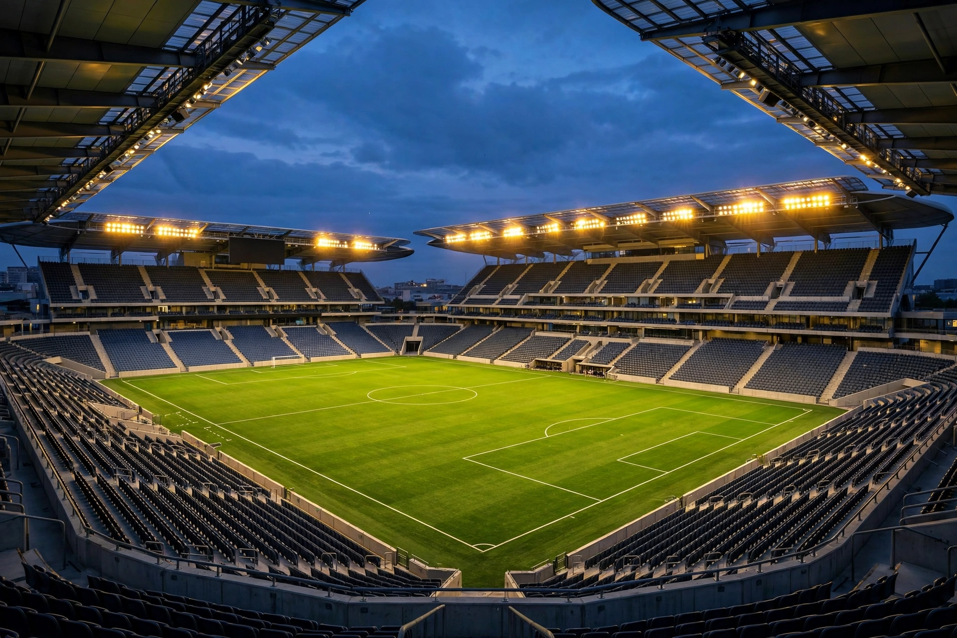 Artificial turf soccer stadium at dusk